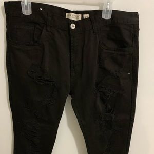 Evolution in Design destressed pair of black jeans